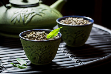 Aromatic green tea in Asian restaurant on black table
