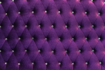 deep Purple velvet texture of sofa closeup shot - luxury violet velvet texture with diamond jewelry background.
