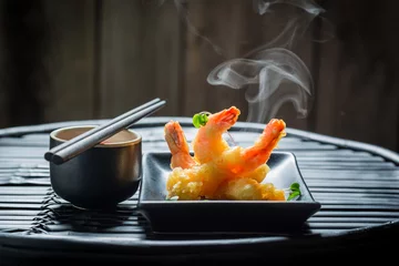 Gordijnen Yummy shrimp in tempura with red sauce © shaiith