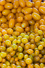 Yellow Cherry Tomatoes at a Produce stand 