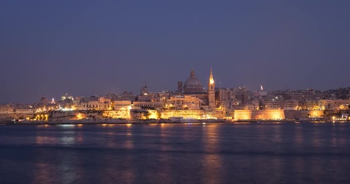Time-lapse of evening view of Valetta, capital of Malta with fireworks, 4k 