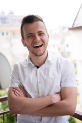 Obraz premium man standing at balcony