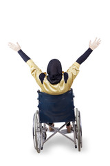 Disabled woman raising hand on studio