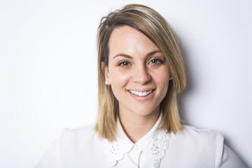 Confident beauty. Cheerful mature woman studio