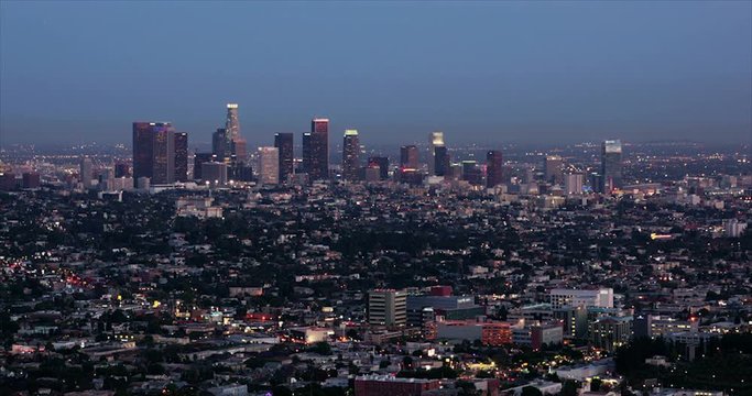 Bright city lights and traffic with view of The Los Angeles Skyline time lapse video