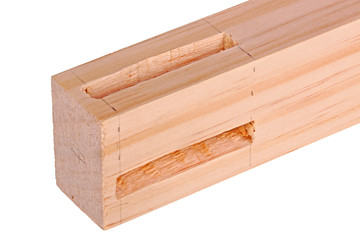 Close-up of a board with a woodworking mortises isolated