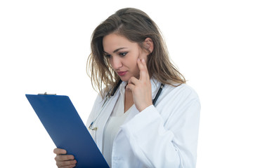 Portrait of young female doctor looking serious