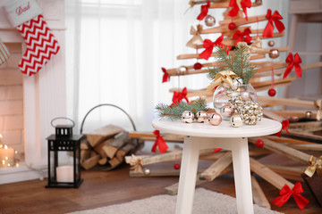 Table with Christmas decoration in living room