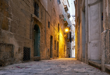 The narrow street Is - Sirena on Senglea in the early morning. Malta