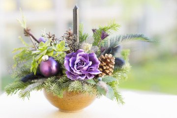 Bouquet has Christmas tree branches and artificial flowers. Christmas flower composition is for the interior house. 