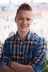 man standing at balcony