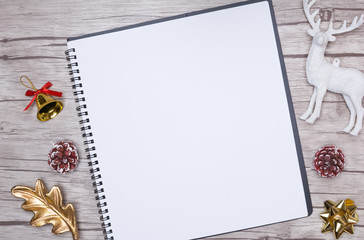 Christmas letter writing on white paper with decorations.