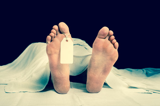 The dead woman's body with blank tag on feet
