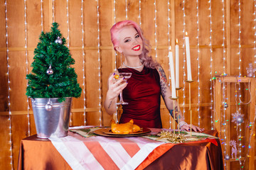 Gorgeous young woman drinks champagne