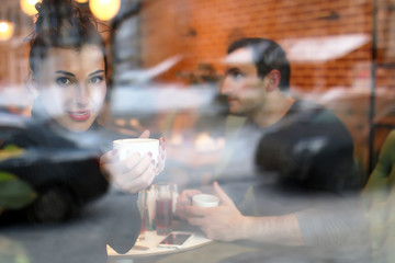 young couple meets in a cafe on a date