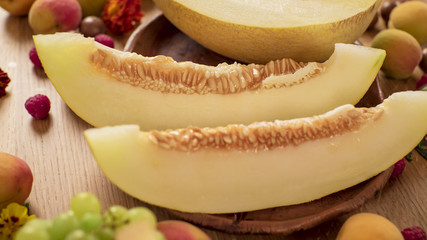 Melon slice on wood table