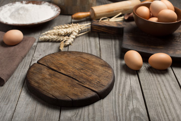 Kitchen table with ingredients for cooking baking