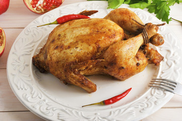 whole roasted chicken with bound feet