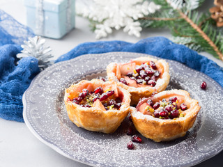 Christmas mini apple pies with pomegranate seeds