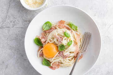 pasta carbonara with prosciutto,  parmesan cheese and eggs yolk