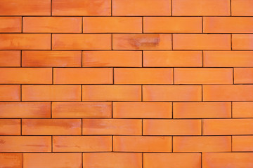 Red brick wall texture for background.