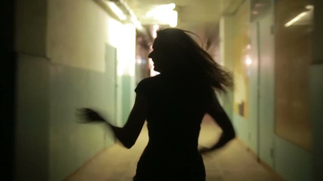 girl runs away from pursuing the stairs