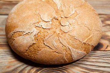Bread on a rustic wooden background