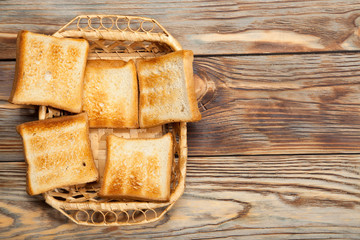 Toast on a rustic wooden background