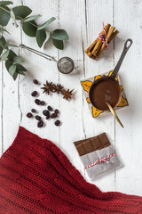 Cup of hot chocolate on wooden background