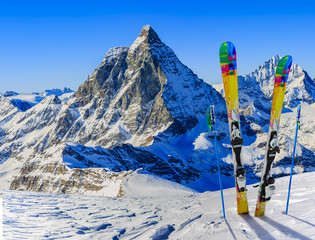 Ski Equipment with panoramic view of Matterhorn on a clear sunny winter day, Zermatt, Switzerland
