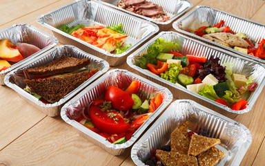 Healthy food in boxes, diet concept.