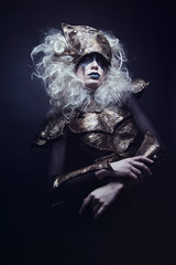 Woman with black make up and white wig 