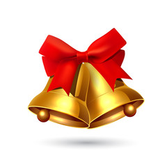 Christmas gold bells with red bow isolated on white background.