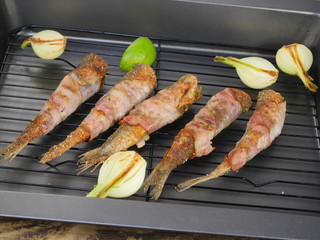 fried fishes herrings on plate