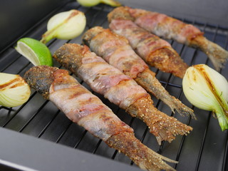fried fishes herrings on plate