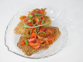 fried fish herring with tomato sauce