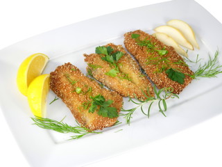 fried fishes herrings on plate