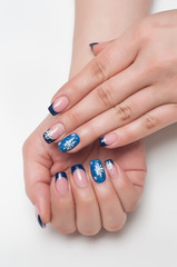 Christmas blue french manicure with white snowflakes