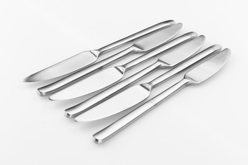 Stainless steel kitchen glossy metal knife isolated over the white background, set of multiple different foreshortenings