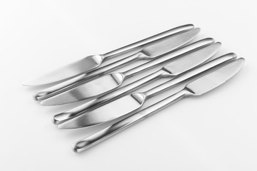 Stainless steel kitchen glossy metal knife isolated over the white background, set of multiple different foreshortenings