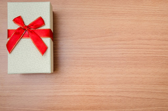 Gift on wooden table