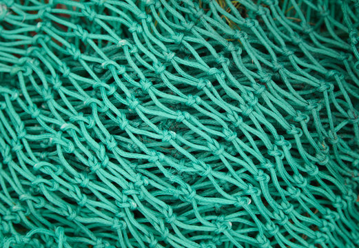 A whole page of green fishing net background texture