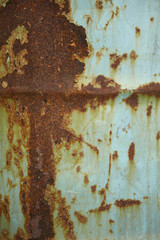 A full page of rusted metal barrel background texture