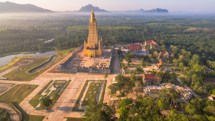 the highest pagoda in the world.pagoda has gold color..the temple and pagoda are building in the large field in the embrace of the mountains.