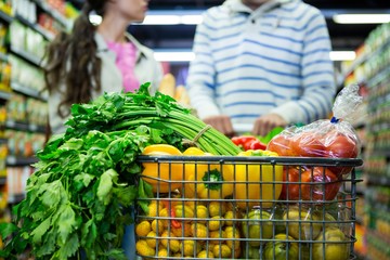 Close-up of various vegetables and fruits in trolley