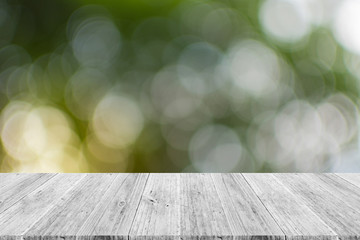 Abstract bokeh nature with wood terrace