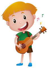 Little boy playing guitar alone