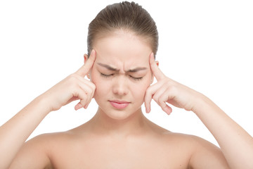 Beautiful young woman with headache touching her temples, isolated in white