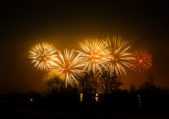 Fototapeta na wymiar Beautiful fireworks above Riga, Latvia