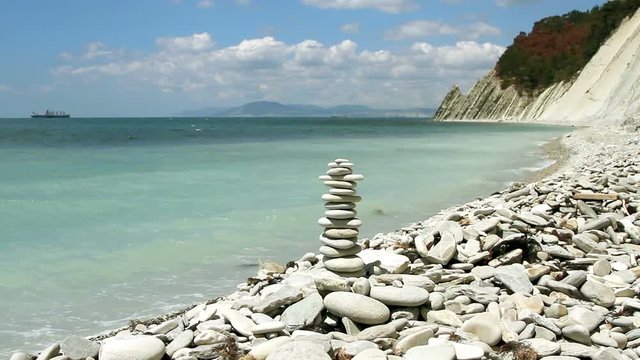 stack of zen stones on the beach